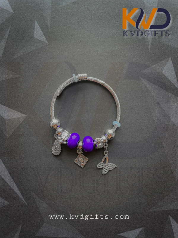 Elegant Silver Charm Bracelet with Purple Beads and Dangling Charms