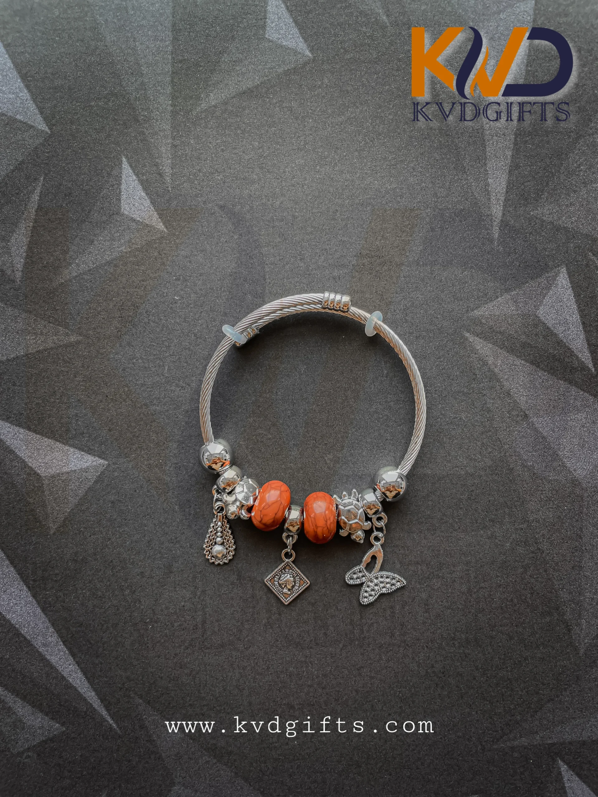 Elegant Silver Charm Bracelet with Brown Beads and Dangling Charms